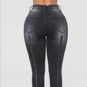 Black high waisted jeans with zipper in the back